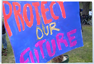 'Protect Our Future' written on a handmade sign