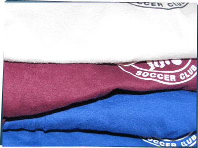 A pile of soccer shirts