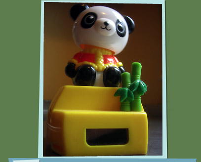 Solar powered panda toy