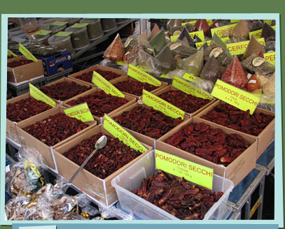 Boxes of sun-dried tomatoes in a stall.