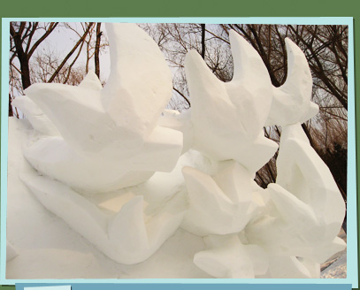 Snow sculpture of a flock of birds