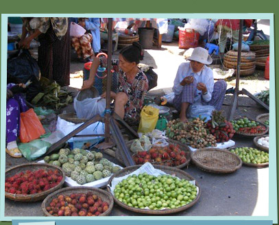 Women selling tropical fruits