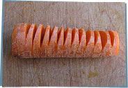 Side view of carrot strummer